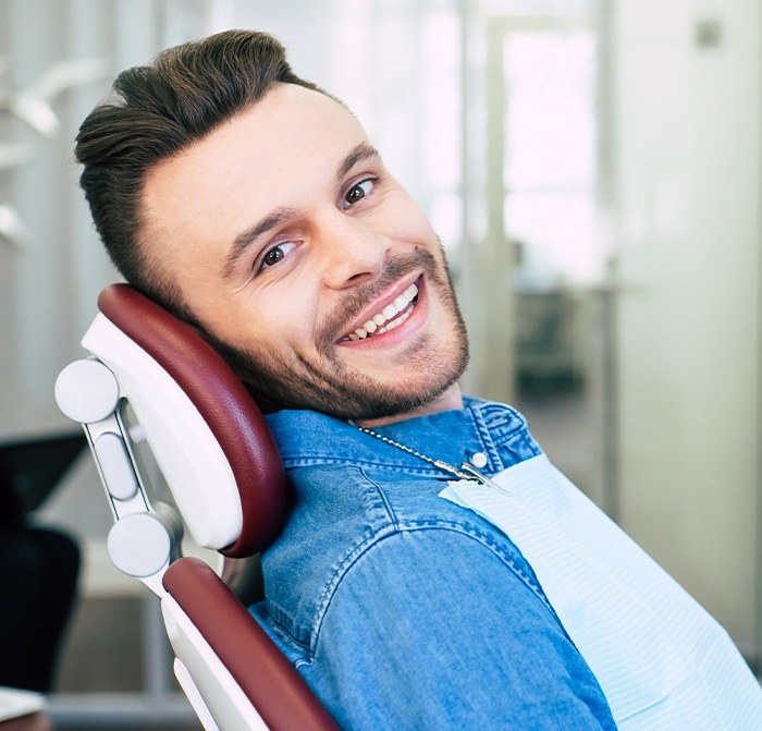 Man smiling after preventive dentistry appointment