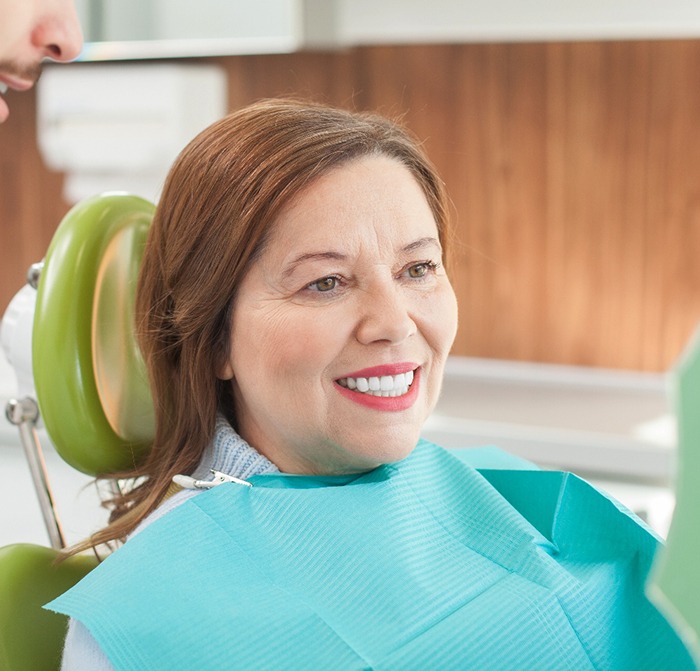 Woman smiling at the dentist