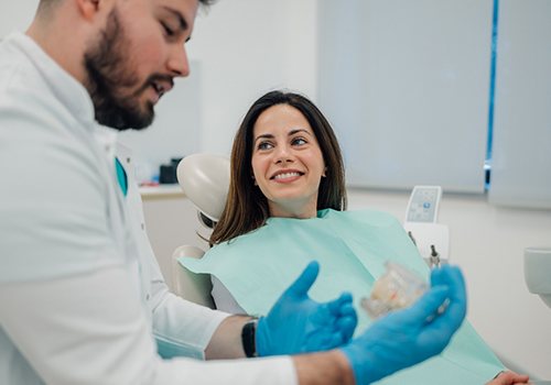 Woman smiling in the dental chair