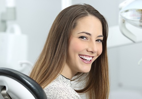 Woman smiling during dental checkup