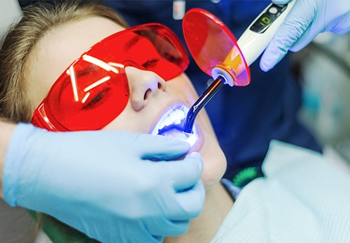 Patient receiving cosmetic dental bonding treatment