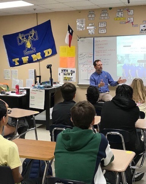 Dr. Butler presenting to classroom