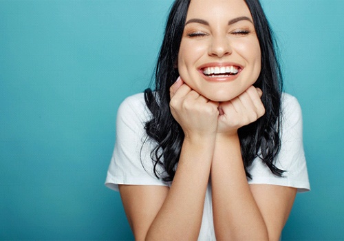 Woman laughing with white teeth