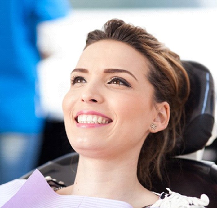 young woman about to undergo root canal therapy in Kerrville