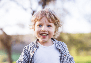 Little boy with healthy smile after children's dentistry