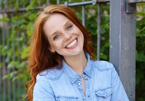 Woman's beautiful smile after tooth-colored fillings