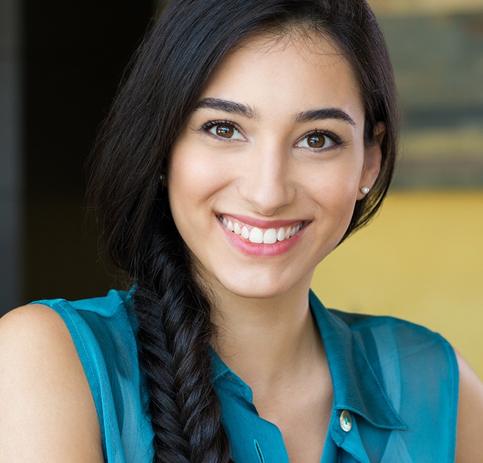 Woman sharing smile after teeth whitening