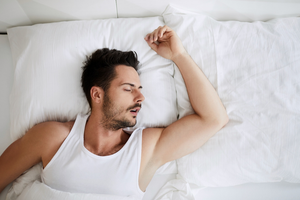 a man sleeping and snoring